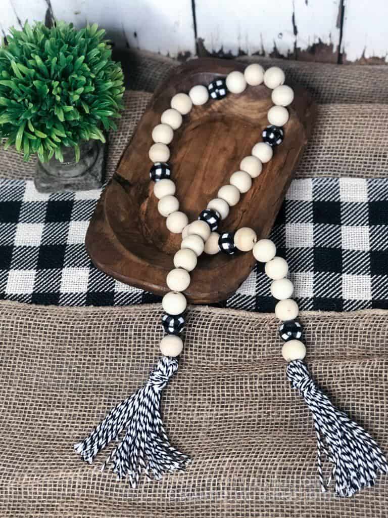 DIY Wood bead garland with tassels [10 min + $5 craft idea]