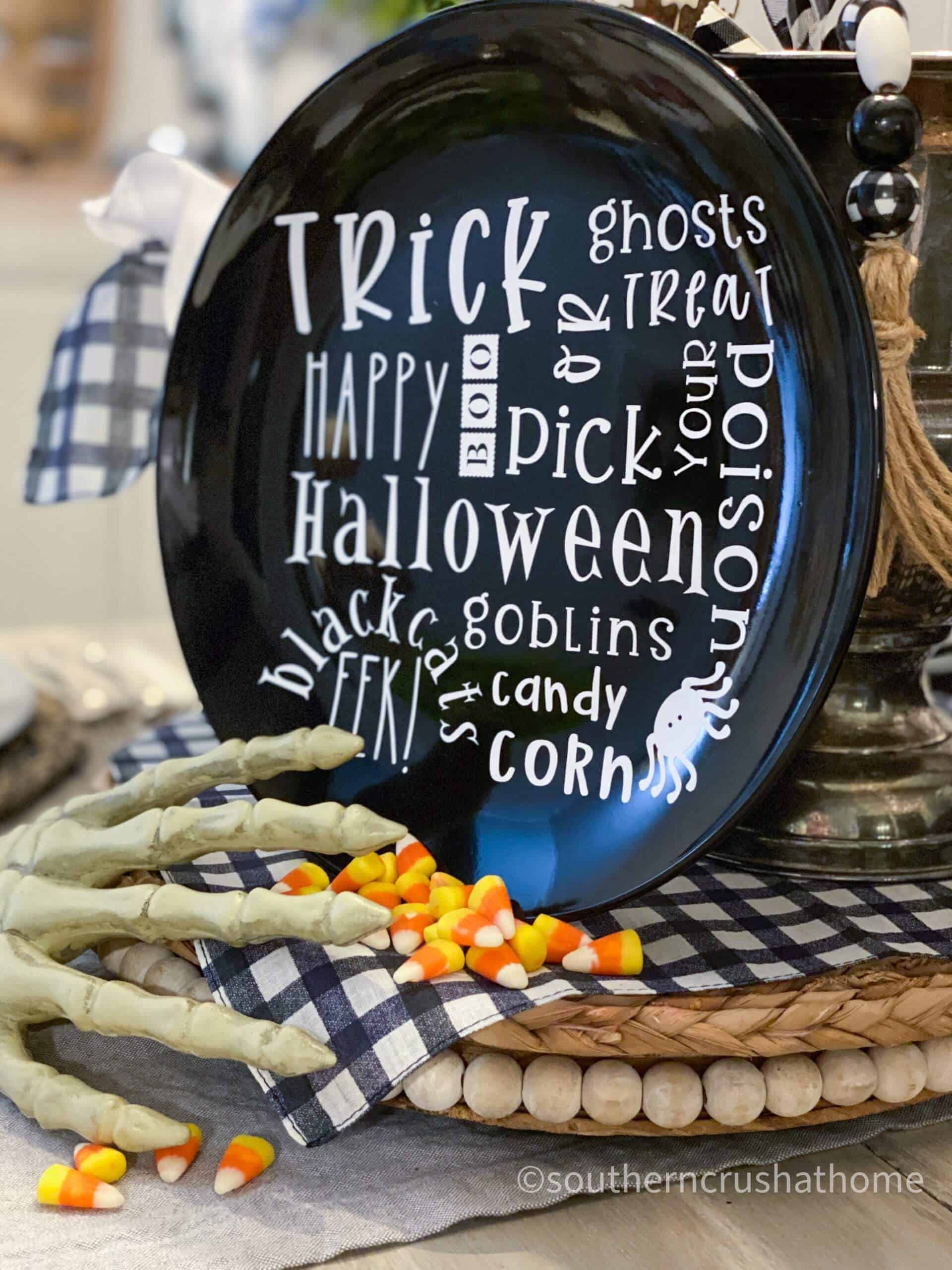 halloween cricut design on dollar store plate centerpiece