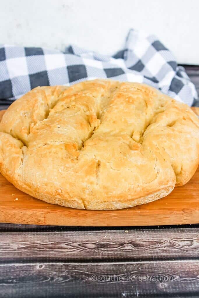 https://www.southerncrushathome.com/wp-content/uploads/2021/12/easy-homemade-dutch-oven-bread-4-683x1024.jpg