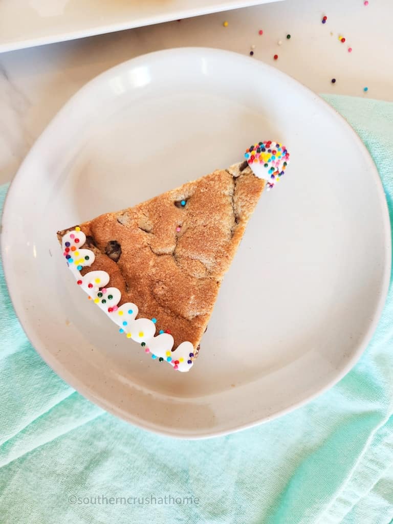 Birthday Cookie Cake slice on a white plate