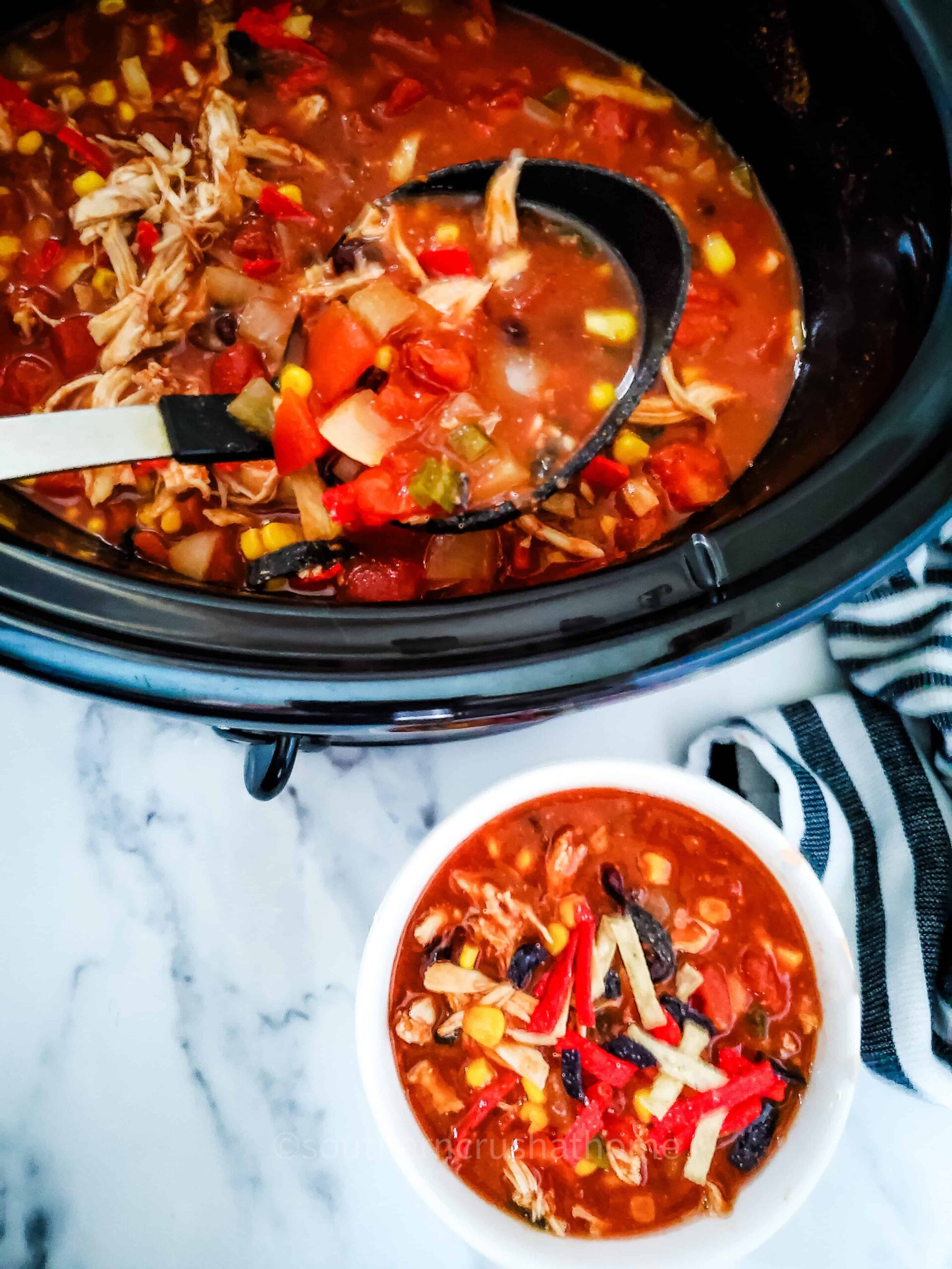 serving Chicken Taco Soup from crockpot