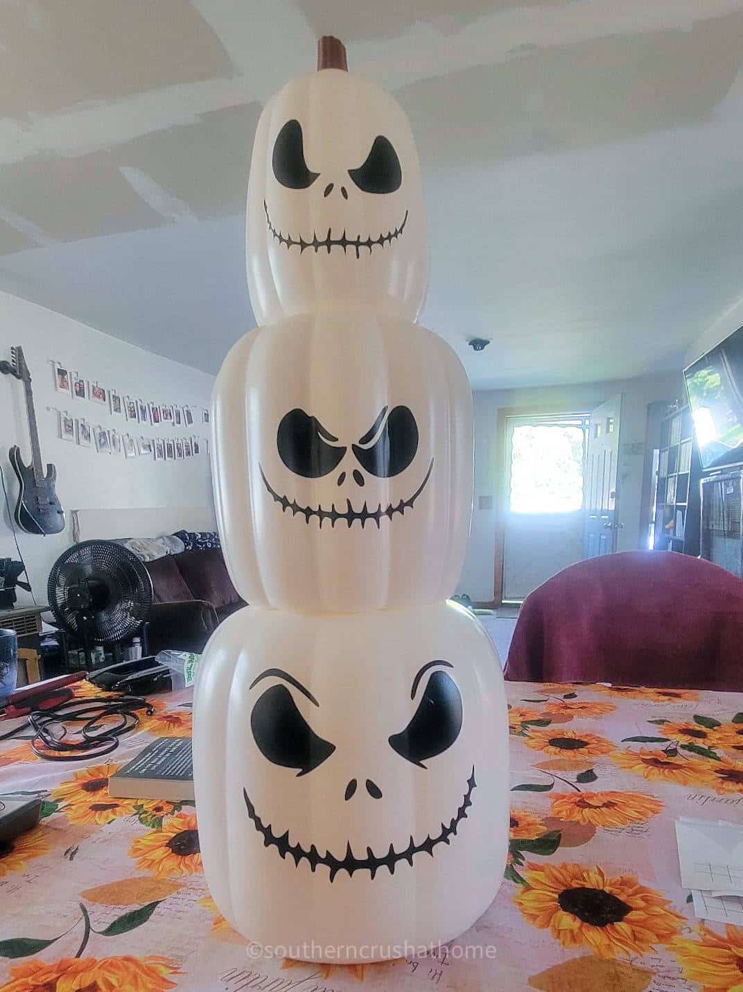 jack skellington stacking pumpkins