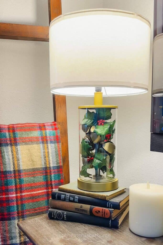 jimgle bells and holly in glass table lamp