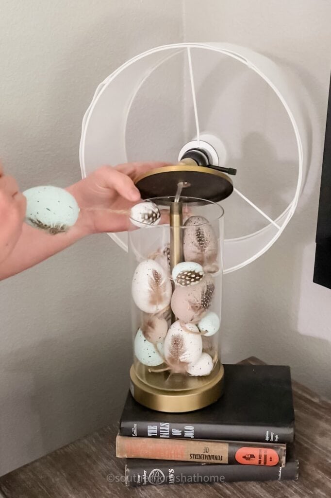 removing egg garland from lamp base