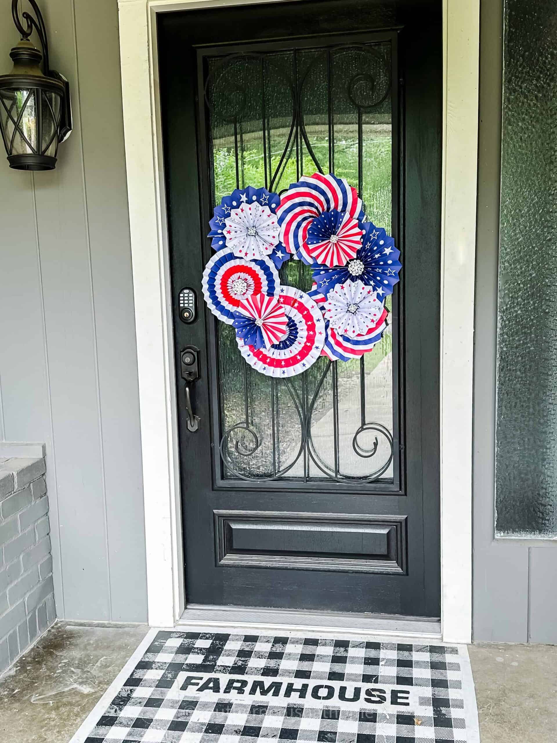 paper fan wreath on front door