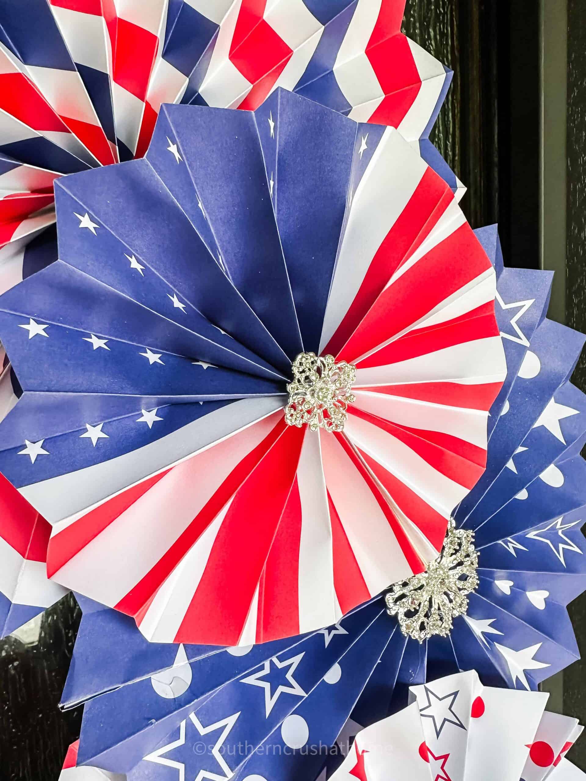up close of red white and blue american flag paper fan