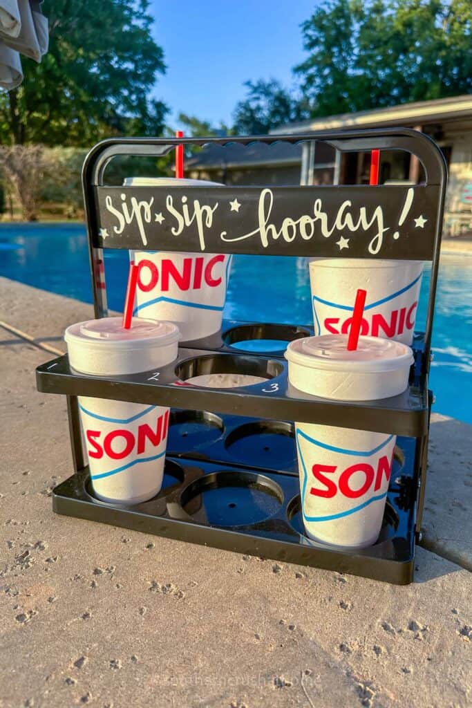 drink carrier with sonic drinks on pool ledge