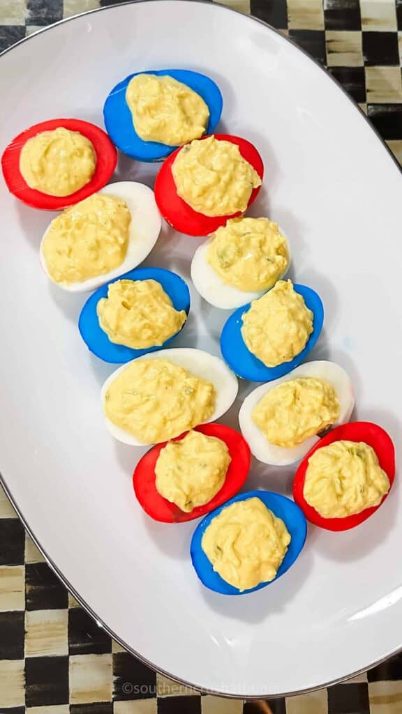 overhead view of red, white, and blue colored deviled eggs