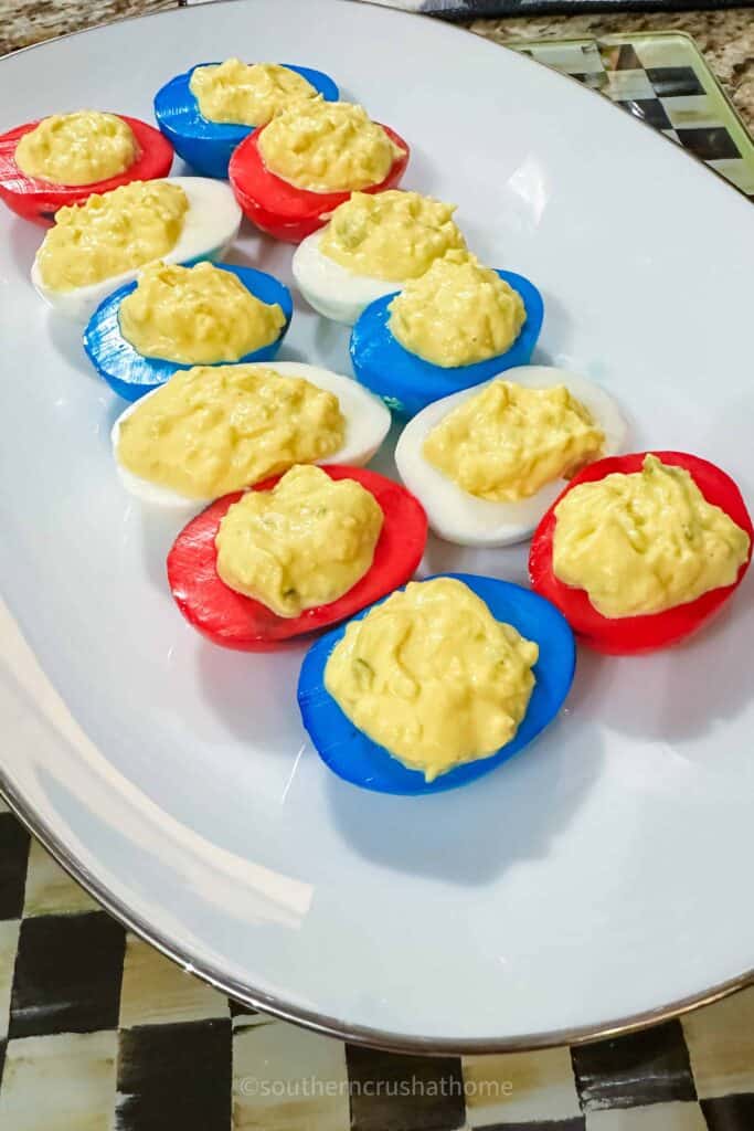 side view of red, white, and blue colored deviled eggs