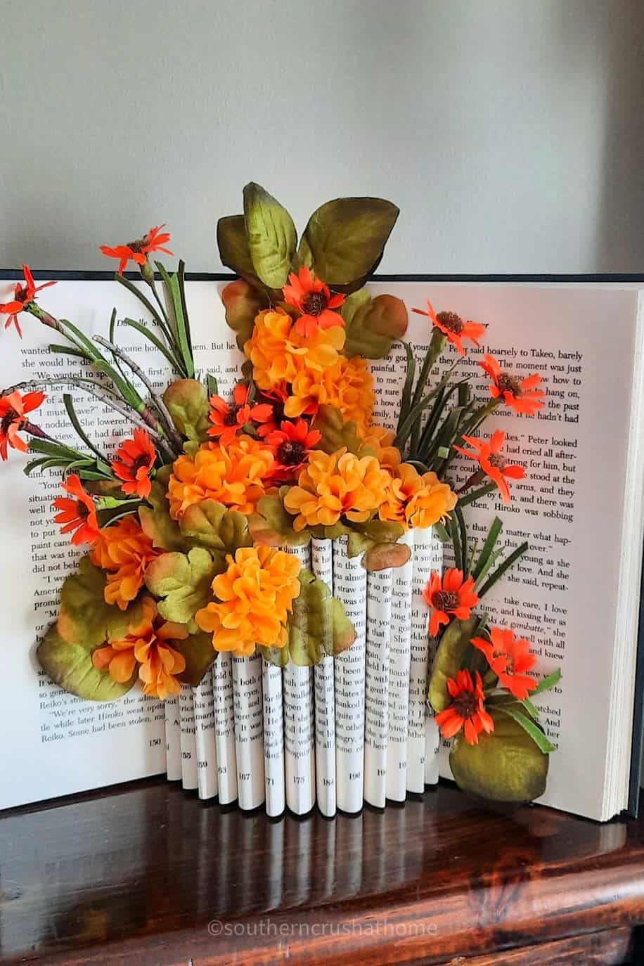 orange book flower vase