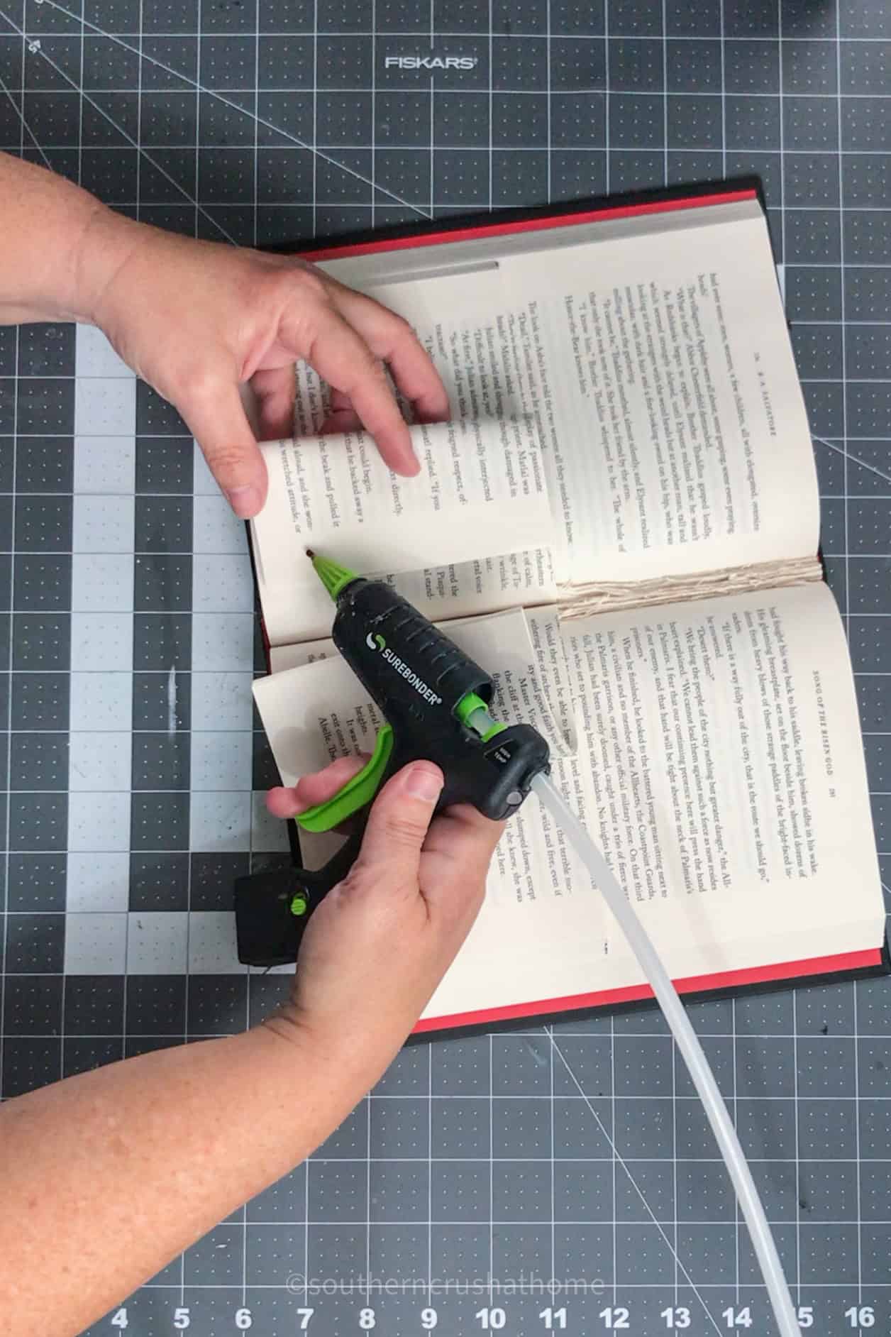 gluing the book pages