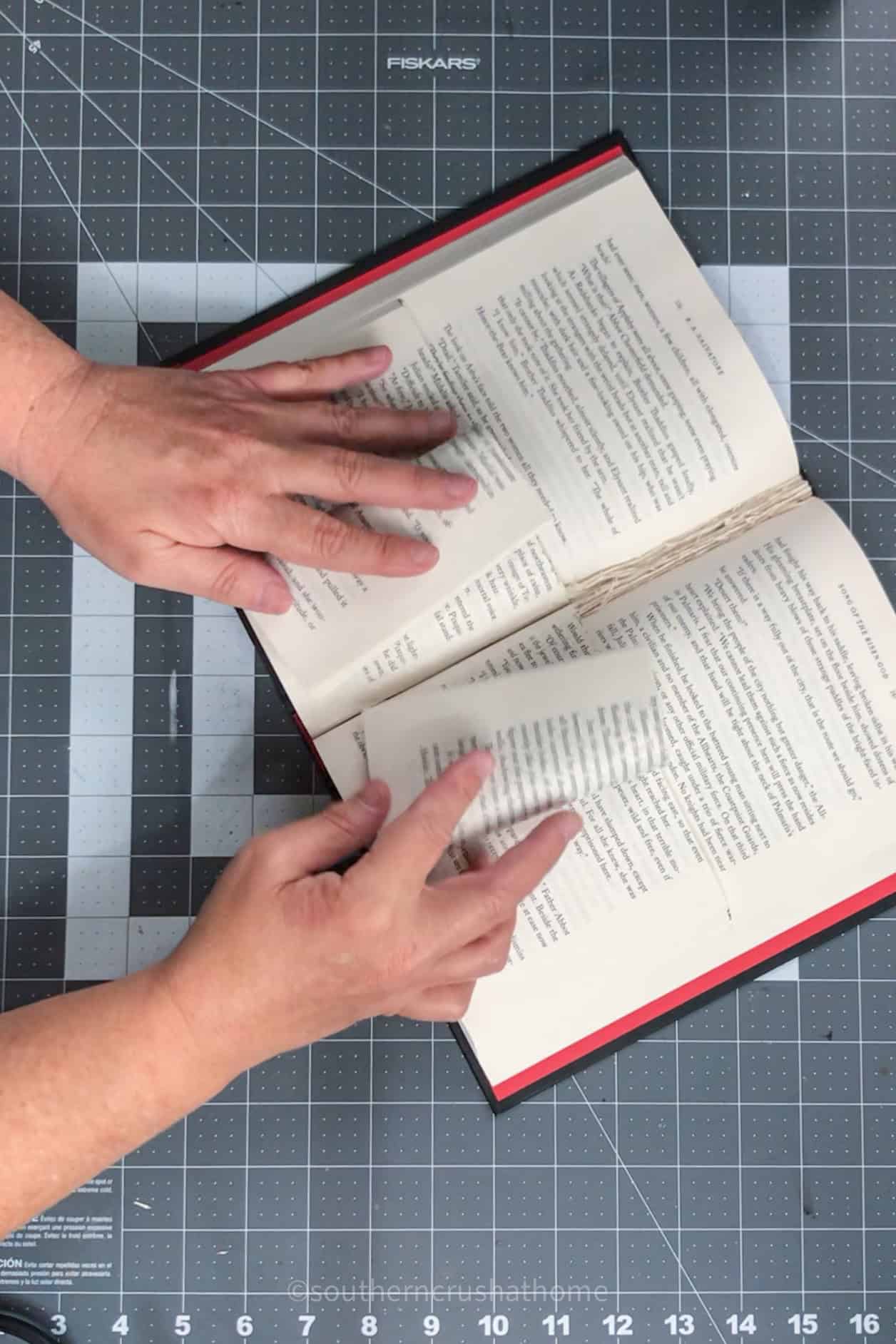 folding book pages in the middle