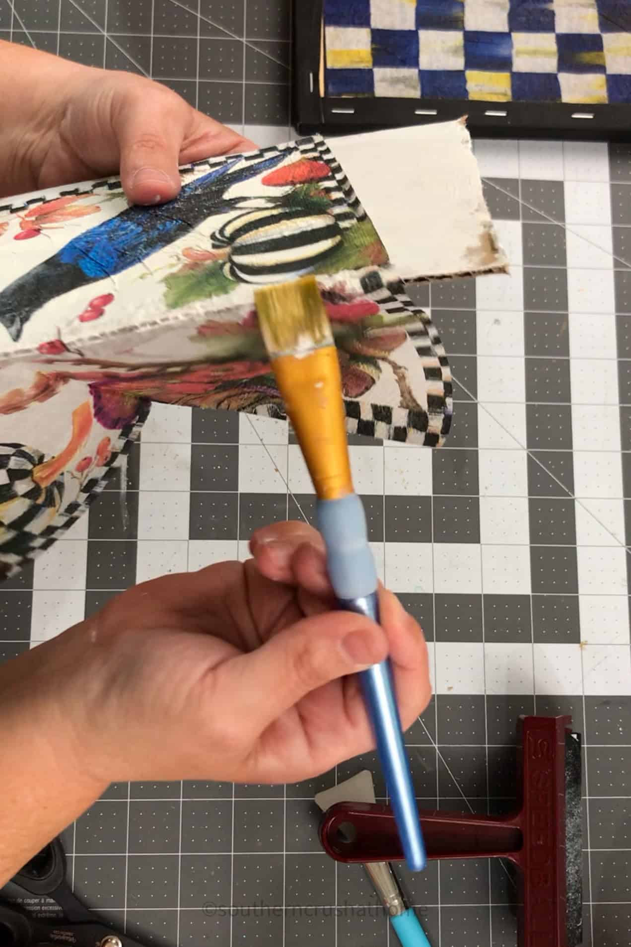 removing excess edge of decoupage napkin