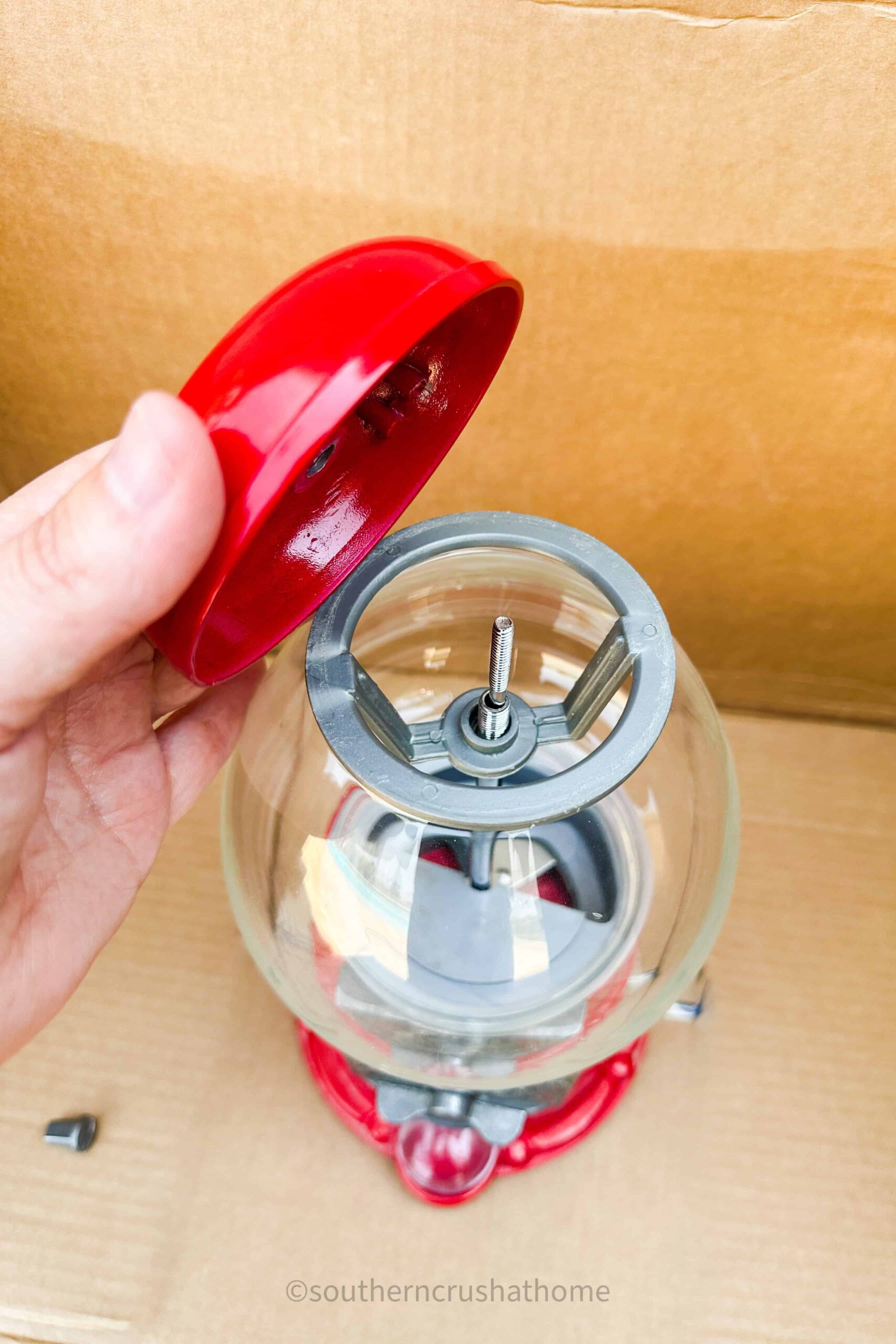 disassemble parts of gumball machine