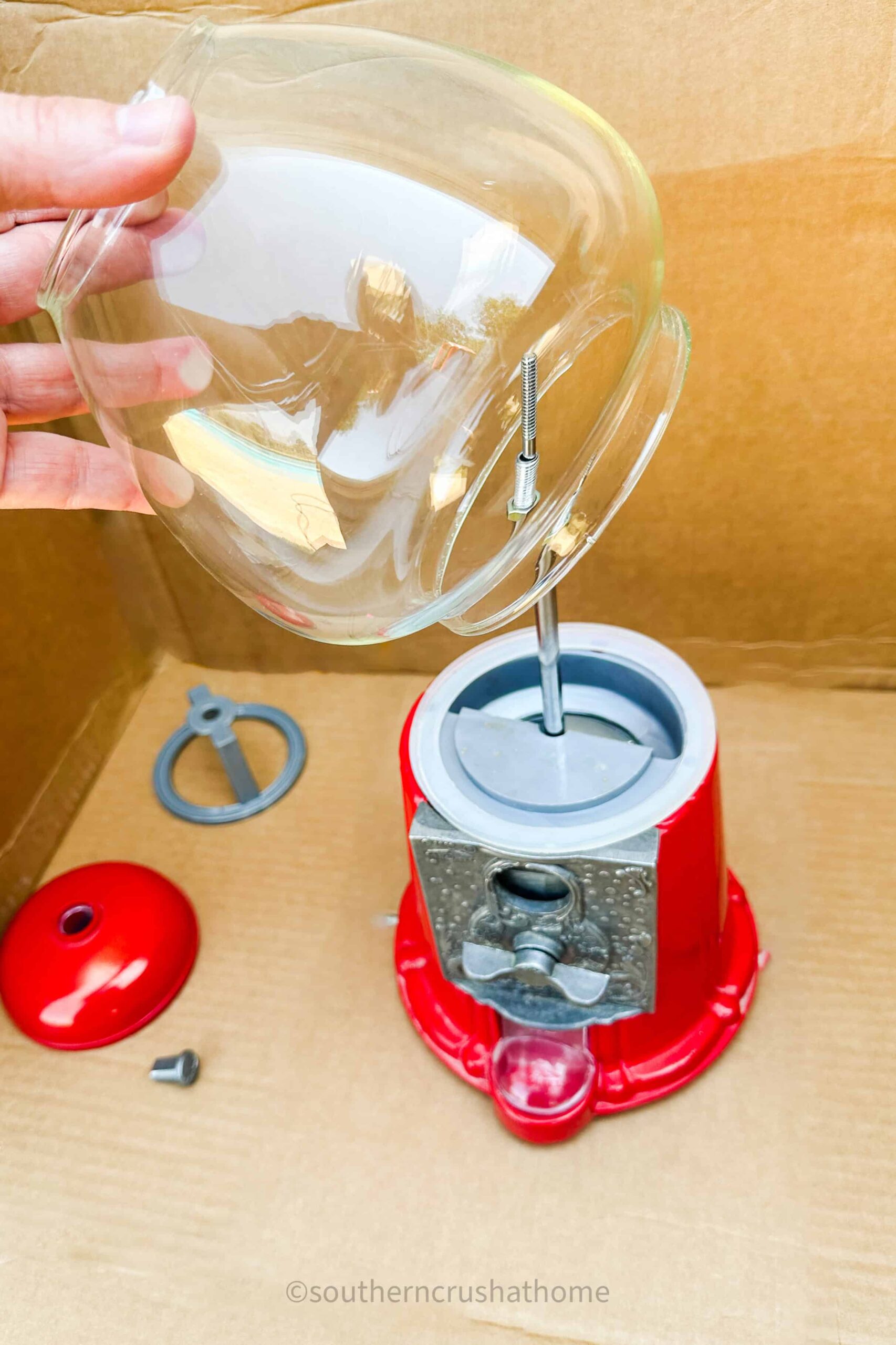 disassemble parts of gumball machine