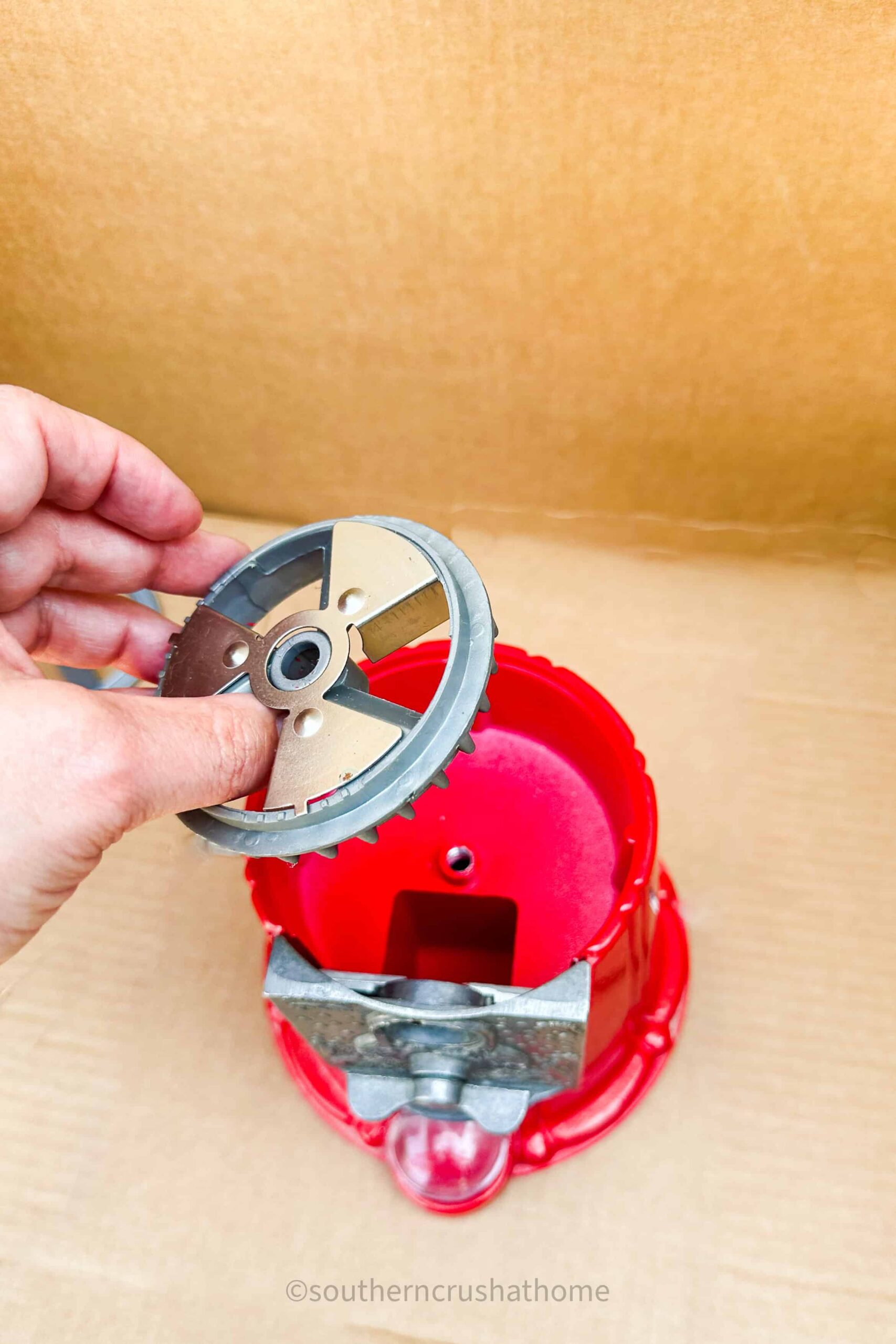 disassemble parts of gumball machine