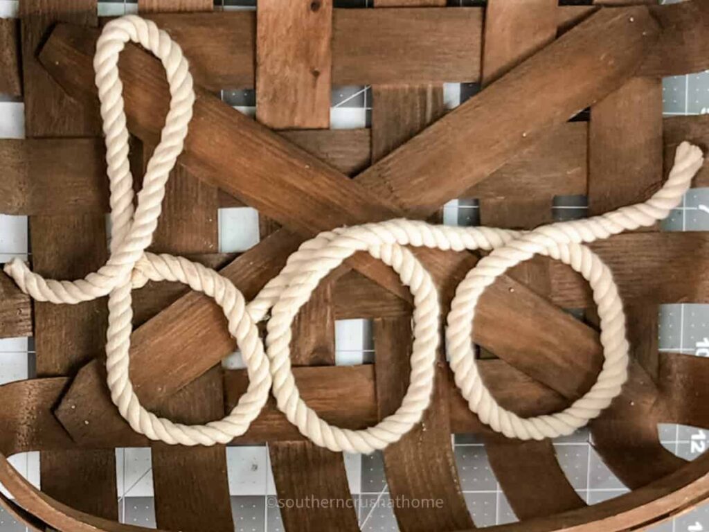 finished nautical rope lettering of the word boo inside tobacco basket