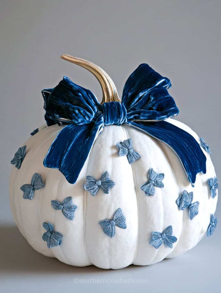 tiny blue bows on white pumpkin