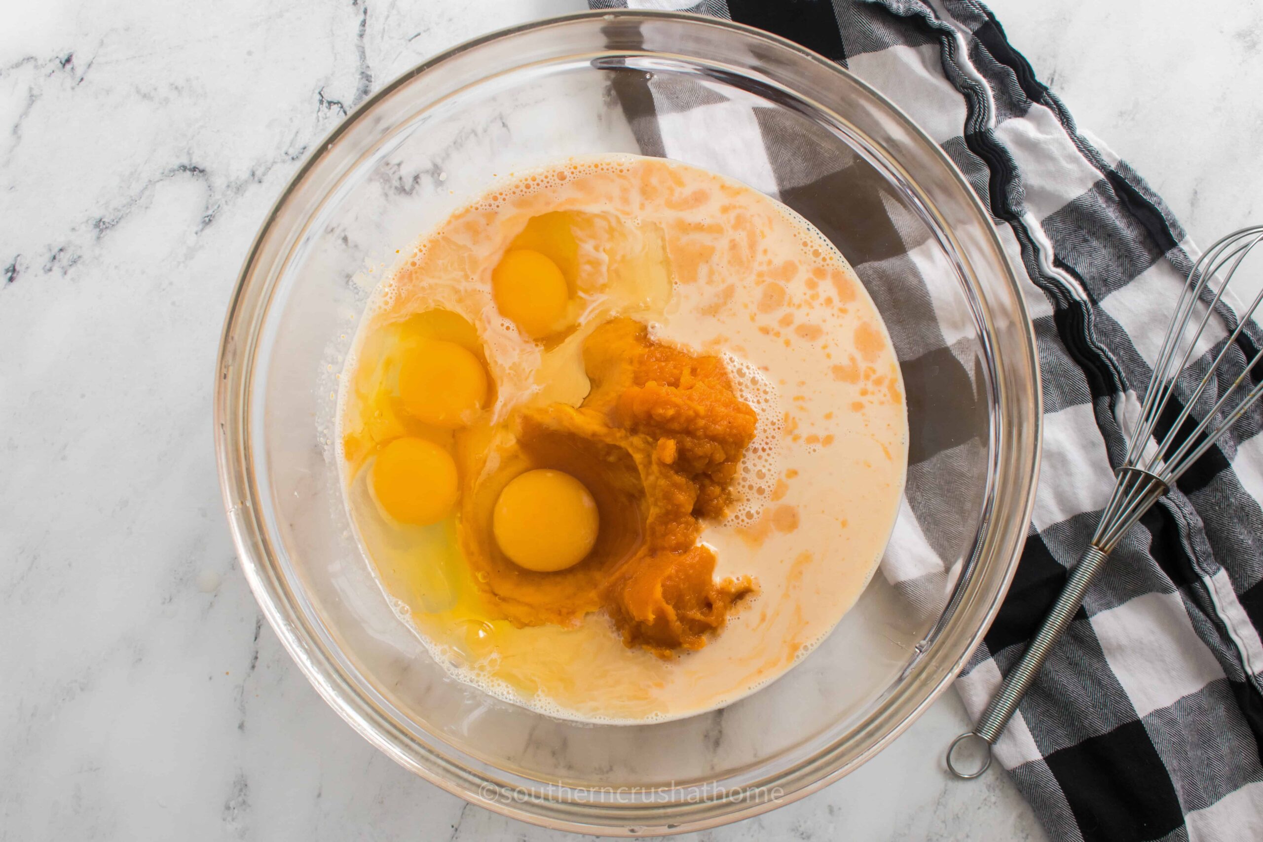 bowl with ingredients for pumpkin dump cake recipe