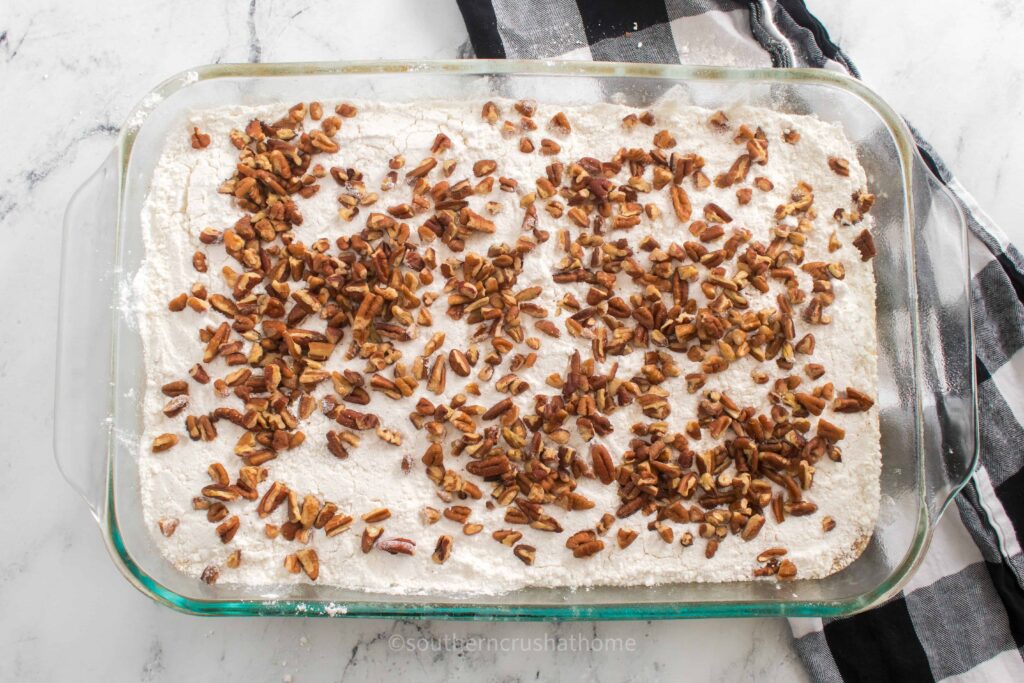 pecans sprinkled on top of dump cake