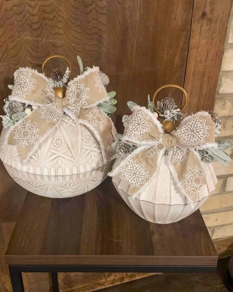 cream colored bowl ornaments with snowflake ribbon