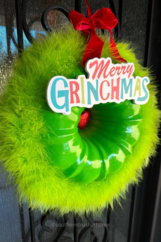 closeup of grinch door decoration