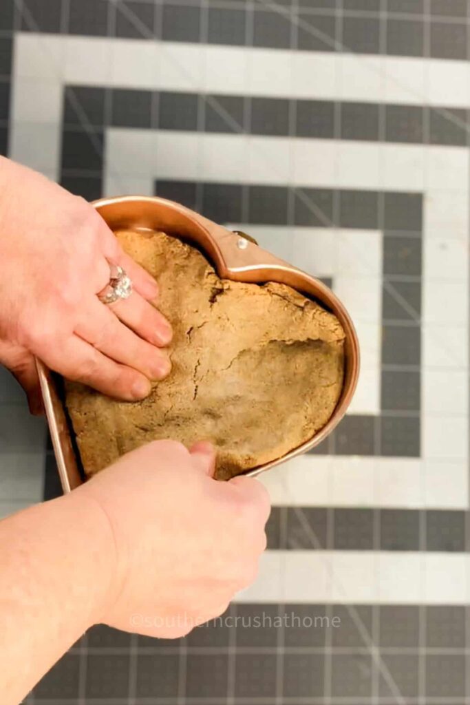 pressing product into mold