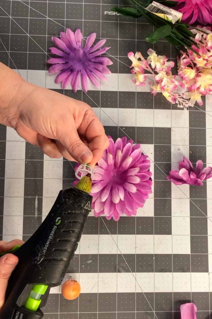 gluing center piece on to flower stack