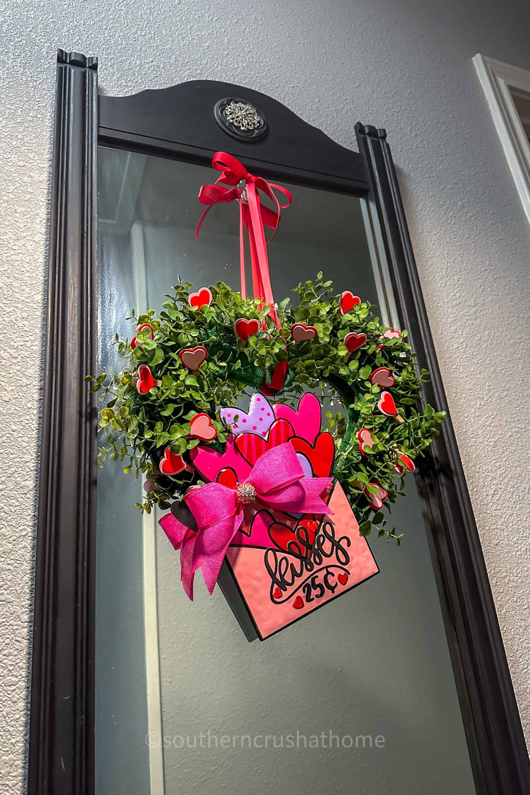 final heart wreath hanging on mirror