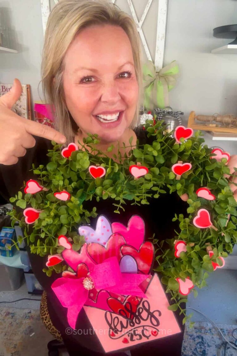 melanie holding valentine's heart wreath