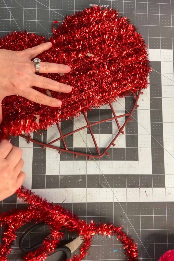 removing tinsel from dollar tree heart decor